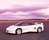 AUT 09 RK0249 02
Vision K2 White 3/4 Side View On Pavement Purple Clouds At Dusk