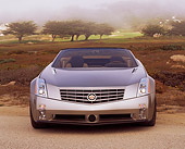 AUT 09 RK0307 03
Cadillac Evoq Convertible Silver Concept Car Head On Shot Trees Background Foggy