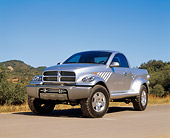 AUT 09 RK0313 05
Dodge Power Wagon Concept Truck Silver 3/4 Front View On Pavement Blue Sky