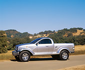 AUT 09 RK0315 04
Dodge Power Wagon Silver Concept Truck Side View On Pavement By Hills Blue Sky