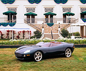 AUT 09 RK0323 08
Jaguar XK180 Convertible Green Concept Car 3/4 Side View On Grass By Building