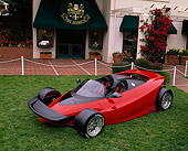 AUT 09 RK0356 14
Ford Indigo Concept Car Red Front 3/4 View On Grass By Stores