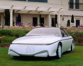 AUT 09 RK0358 02
1988 Lincoln Machete Concept Blue 3/4 Front View On Grass By Building