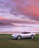 AUT 09 RK0381 02
Jaguar F-Type Roadster Concept Car Silver 3/4 Side View On Grass By Water Filtered