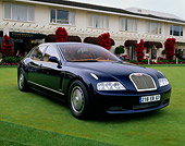 AUT 09 RK0392 04
Bugatti EB218 Blue 3/4 Front View On Grass Building Background