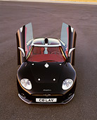AUT 09 RK0466 02
Spyker C8 Laviolette Coupe Black Overhead Head On Shot Doors Up On Pavement