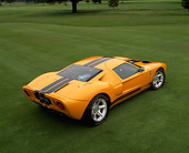 AUT 09 RK0493 01
Ford GT40 Prototype Orange With Black Stripes Overhead Rear 3/4 View On Grass