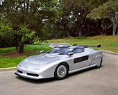 AUT 09 RK0598 03
1988 Audi Aztec Italdesign Giugiaro Spider Silver 3/4 Front View On Pavement By Trees