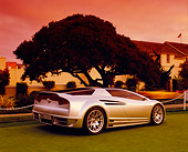 AUT 09 RK0717 11
Toyota Alessandro Volta Hybrid Concept Silver 3/4 Rear View On Turf By Tree