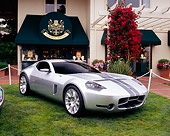 AUT 09 RK0727 04
Ford Shelby GR-1 Silver Gray Stripes 3/4 Front View On Grass By Building
