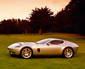 AUT 09 RK0736 01
Ford Shelby GR-1 Silver Gray Stripes 3/4 Front View On Grass By Trees