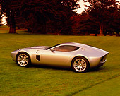 AUT 09 RK0743 01
Ford Shelby GR-1 Silver Gray Stripes 3/4 Rear View On Grass Filtered