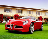 AUT 09 RK0791 05
Alfa Romeo 8C Spider Red Low 3/4 Front View On Turf By Building