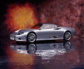 AUT 09 RK0836 02
2006 Spyker C8 Double 12 S Silver 3/4 Side View On Mylar Floor Studio