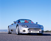 AUT 09 RK0842 02
2006 Spyker C8 Double 12 S Silver Low 3/4 Front View  On Pavement Blue Sky