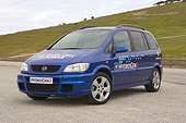 AUT 09 RK0873 01
Chevy Hydrogen 3 Blue 3/4 Front View On Pavement By Grass Hills