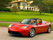 AUT 09 RK0887 01
Tesla Roadster Electric Car Red 3/4 Front View On Pavement By Grass And Trees