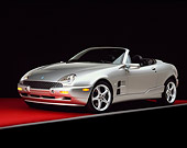 AUT 10 RK0007 08
2000 De Tomaso Mangusta Convertible Silver 3/4 Side View On Red Floor Gray Line Studio