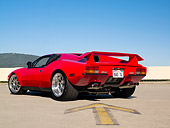 AUT 10 RK0022 01
1974 De Tomaso Pantera Red  Low 3/4 Rear View On Pavement