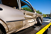 AUT 11 RK0006 01
Close Up Of Crashed Damaged Car On Tow Truck Bed