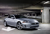AUT 12 BK0003 01
2011 Jaguar XKR Coupe Silver 3/4 Front View In Parking Garage At Night