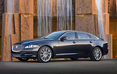 AUT 12 BK0009 01
2012 Jaguar XJF Black 3/4 Side View On Pavement By Waterfalls