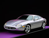 AUT 12 RK0108 03
2001 Jaguar XKR Silverstone Coupe 3/4 Front View On Purple Floor Gray Line Studio