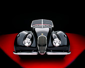 AUT 12 RK0195 02
1954 Jaguar XK120 M Roadster Black Head On View Studio