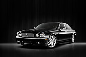 AUT 12 IZ0014 01
2008 Jaguar XJ8 Black 3/4 Front View Studio