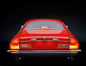 AUT 12 RK0001 08
1990 Red Jaguar XJS Rouge Rear View Brake Lights On Studio Background