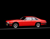 AUT 12 RK0003 02
1990 Red Jaguar XJS Rouge Side View On Red Line Parking Lights On Studio Background