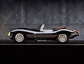 AUT 12 RK0007 06
1957 Jaguar XKSS Convertible Black Profile On Gray Line Gray Marble Background Studio