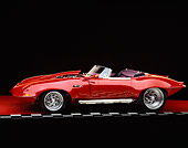 AUT 12 RK0083 03
1967 Jaguar Boss Convertible Red 3/4 Side View Red Floor Checkered Line Studio