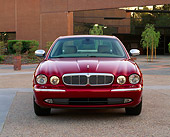 AUT 12 RK0184 02
2004 Jaguar XJ Burgundy Head On View By Building
