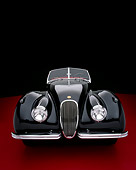 AUT 12 RK0196 04
1954 Jaguar XK120 M Roadster Black Head On View Studio