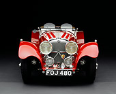 AUT 12 RK0206 19
1939 Jaguar SS100 Red Convertible Head On Shot Studio