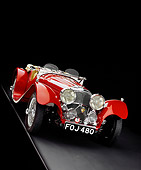 AUT 12 RK0210 09
1939 Jaguar SS100 Convertible Red Slanted 3/4 Front View Studio