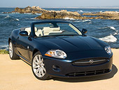 AUT 12 RK0225 01
2007 Jaguar XK Convertible Blue 3/4 Front View On Sand