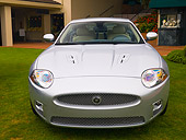 AUT 12 RK0250 01
2007 Jaguar XKR Silver Head On View On Grass By Building