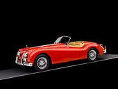 AUT 12 RK0253 02
1957 Jaguar XK140 Convertible Red 3/4 Side View Studio