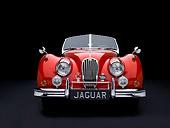 AUT 12 RK0254 01
1957 Jaguar XK140 Convertible Red Low Head On View Studio