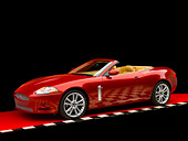 AUT 12 RK0265 01
2007 Jaguar XKR Convertible Red 3/4 Side View Checkered Line Studio