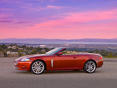 AUT 12 RK0270 01
2007 Jaguar XKR Convertible Copper 3/4 Front View On Pavement