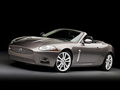 AUT 12 RK0301 01
2009 Jaguar XKR Convertible Gray 3/4 Front View Studio