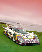 AUT 13 RK0040 11
Silk Cut Jaguar XJR-9 Race Car 3/4 Front View On Grass Filtered Le Manns Winner In 1988
