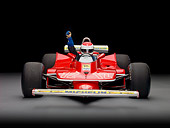 AUT 13 RK0321 01
1979 Ferrari 312 T4 F1 Race Car Red Head On View With Rider Studio
