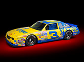 AUT 13 RK0389 01
1987 Chevrolet Monte Carlo Stock Car Blue And Yellow 3/4 Front View In Studio