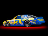 AUT 13 RK0392 01
1987 Chevrolet Monte Carlo Stock Car Blue And Yellow 3/4 Rear View In Studio