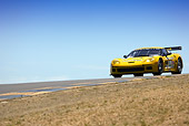 AUT 13 RK0061 01
Chevrolet Corvette C6-R Yellow Race Car On Track 3/4 Front View