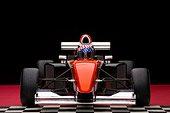 AUT 13 RK0149 01
2006 Mazda Pro Formula Black Orange And White Head On View With Driver Studio